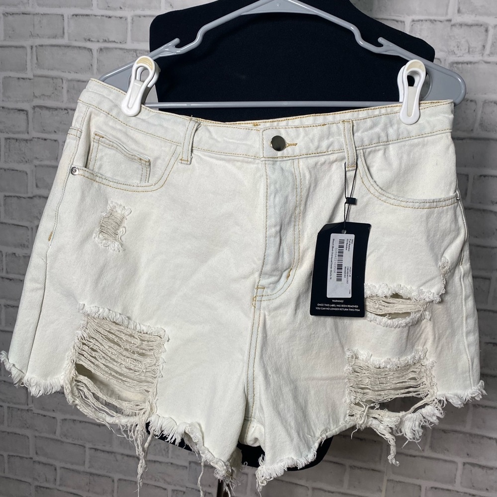 Bleach wash distressed denim shorts